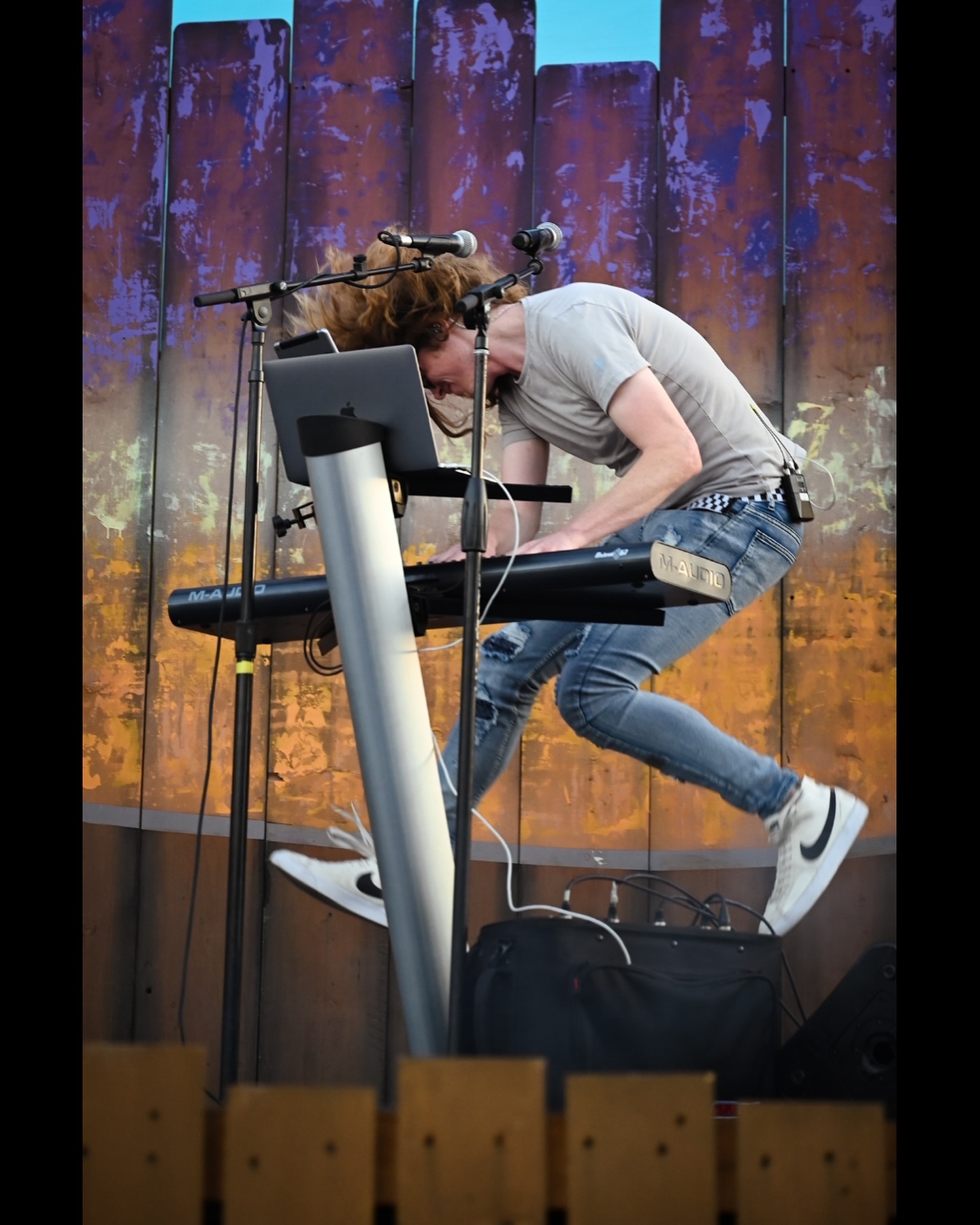 Performer jumping onstage
